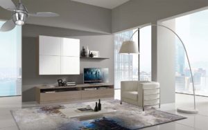 Tappeto moderno astratto grigio, azzurro e nero in un soggiorno luminoso