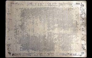 Dettaglio di tappeto moderno grigio e beige dall’effetto vissuto