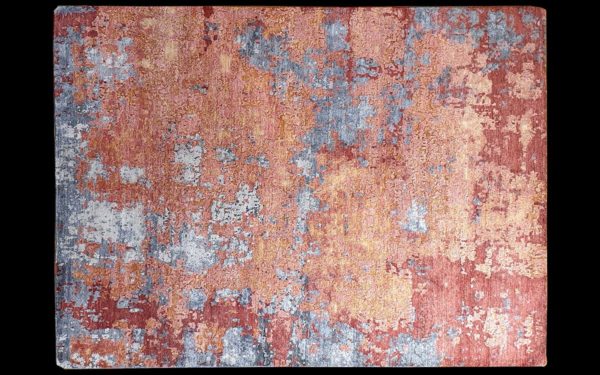 Dettaglio di tappeto moderno astratto corallo, azzurro e crema