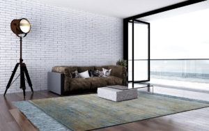 Tappeto moderno beige e azzurro con effetto vissuto in un soggiorno contemporaneo