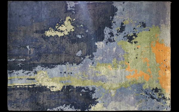 Dettaglio di tappeto moderno astratto blu, verde e arancione